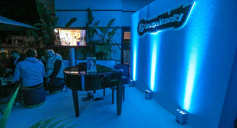 Alternative text - Terrasse de nuit du stand du Groupe Novelty lors de Heavent Meetings 2025